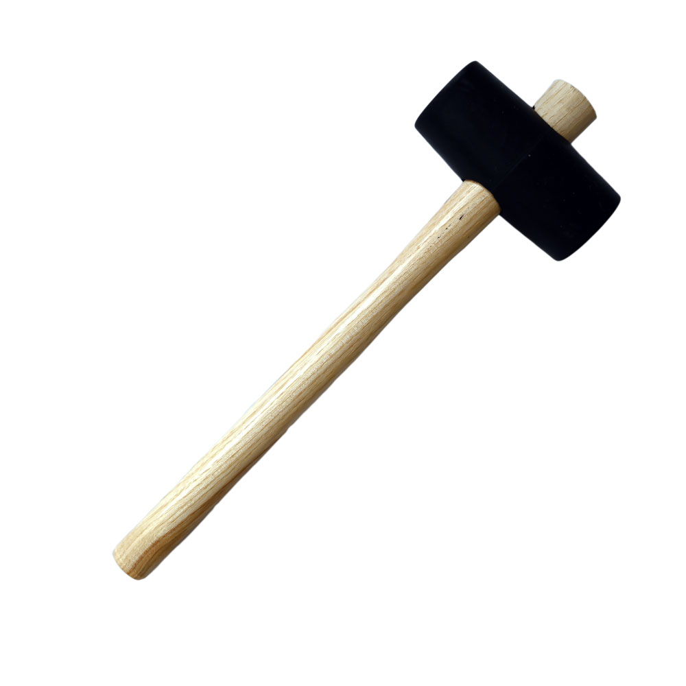 Rubber hammer with wooden handle, 40 mm diameter.