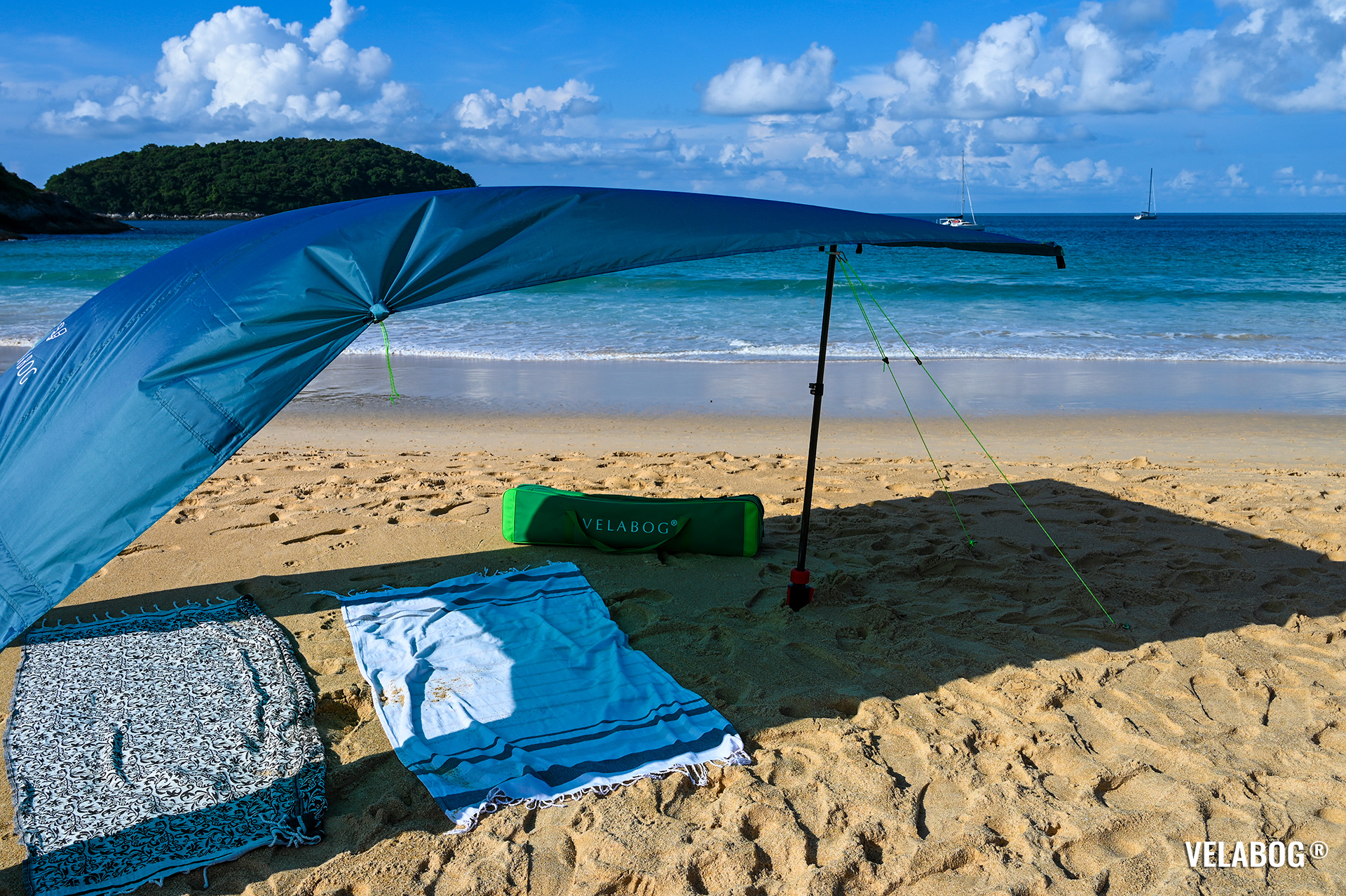 Beach sun sail Velabog Breeze, blue. Best beach canopy tent. Better than beach umbrellas and pop up tents. Setup option for light to strong wind. View from the side. Details.