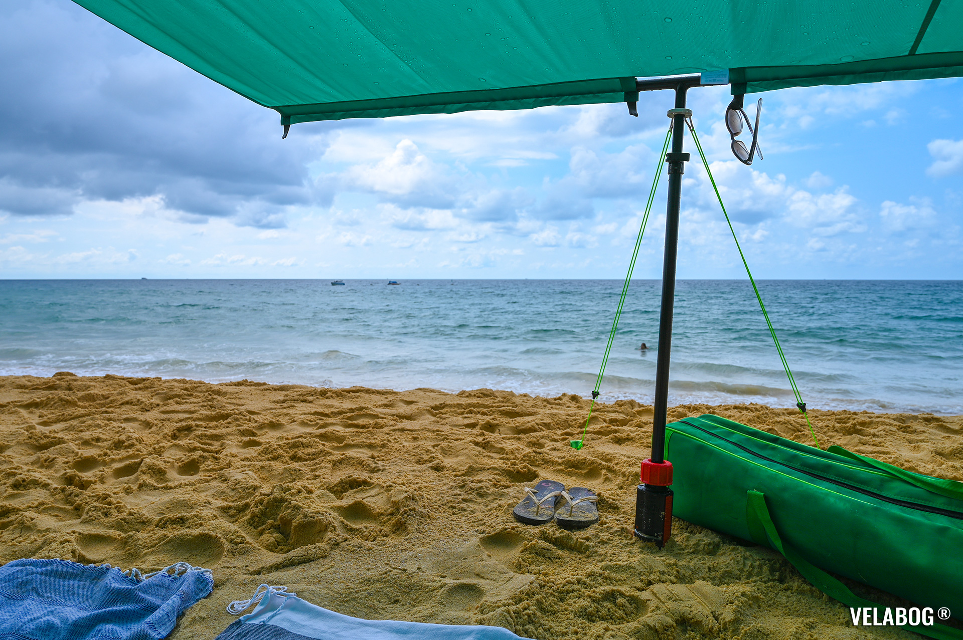 Beach sun sail Velabog Breeze, green.  Best beach canopy tent, best shelter on the beach also by rain. Setup option for no, light or gusty wind. Bottom view. Details.