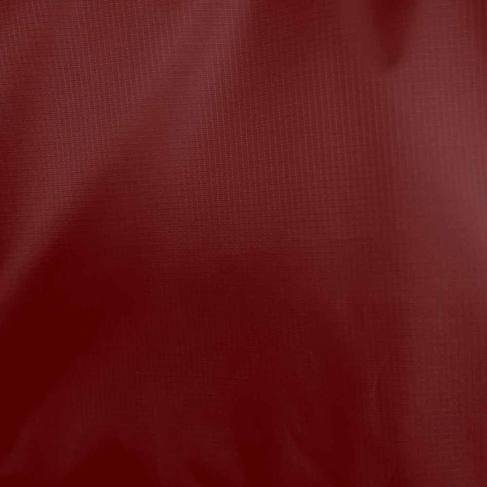 Детальный вид поверхности ткани солнечного паруса палатки Velabog Breeze. 100% полиэстер рипстоп. Цвет красный.